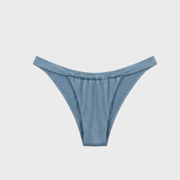 Luxury celestial blue bikini bottoms featuring a Brazilian cut and softly gathered front panel in signature shiny fabric.