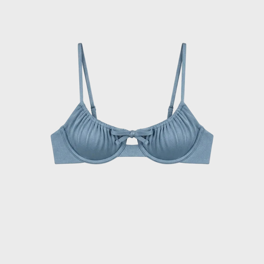 Luxury celestial blue underwire bikini top featuring gathered cups and a signature front tie detail on a white background.