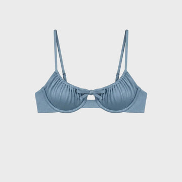 Luxury celestial blue underwire bikini top featuring gathered cups and a signature front tie detail on a white background.
