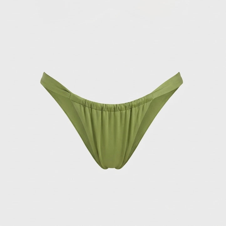Luxury green bikini bottoms in Kiwi featuring a cheeky cut and signature shiny fabric 
