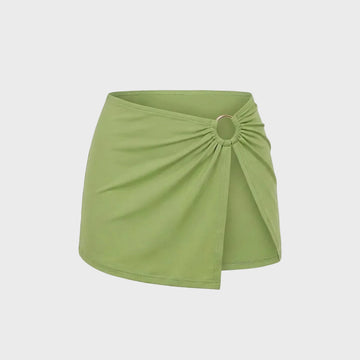 Luxury kiwi green bikini skirt featuring a signature gold ring detail and softly gathered front in vibrant green.