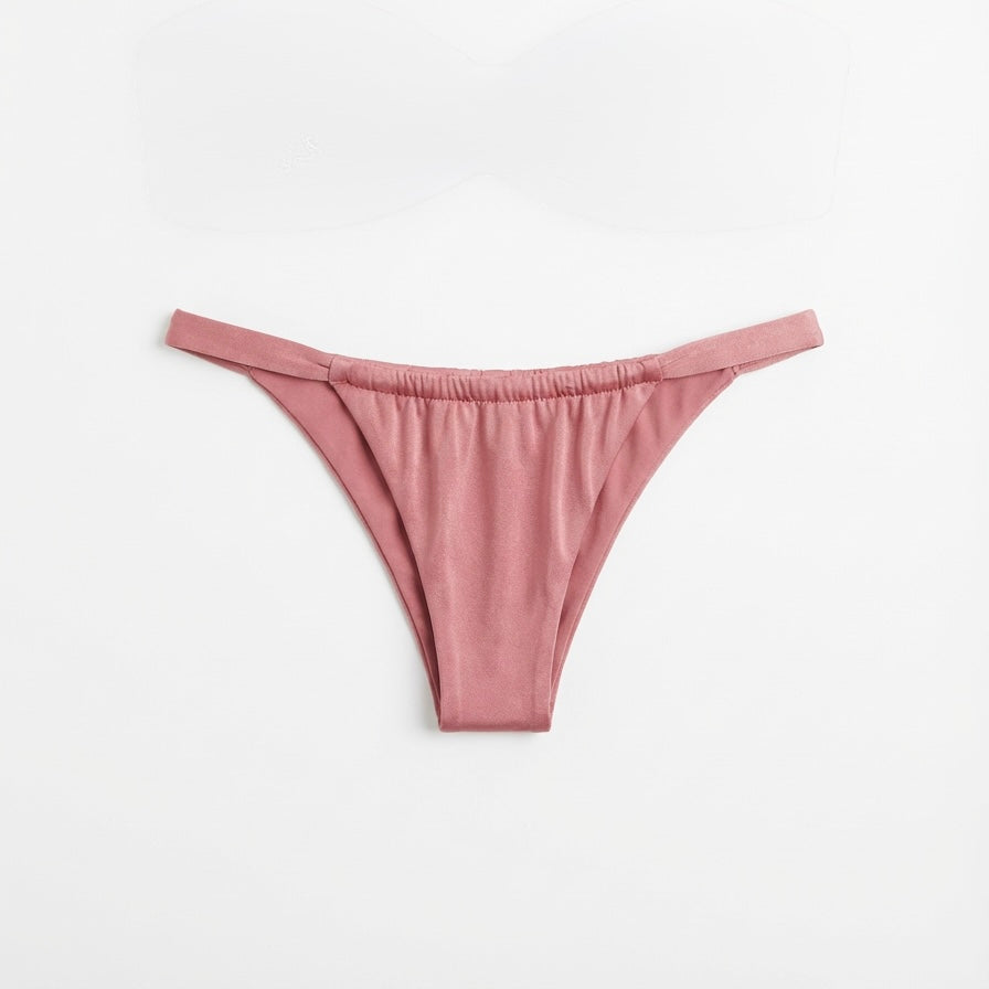 Luxury pink bikini bottoms in Rosé featuring a cheeky cut and signature shiny fabric