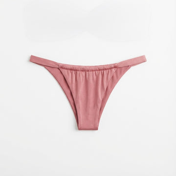 Luxury pink bikini bottoms in Rosé featuring a cheeky cut and signature shiny fabric