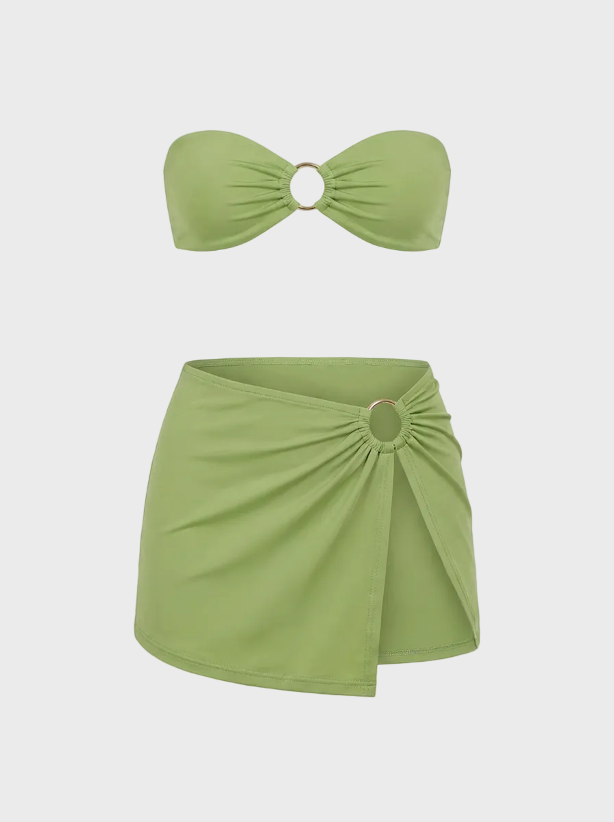 Luxury green bandeau bikini top and matching resort skirt in Kiwi; high-end vacation swim set from a modern Vancouver swimwear brand.